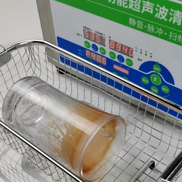 Ultrasonic Cleaner Removing Stubborn Tea Stains From Cup Glassware