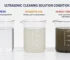 Comparison of three beakers showing fresh clear ultrasonic cleaning solution, moderately used cloudy solution, and heavily contaminated dark solution with visible particles