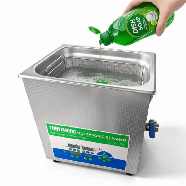 A small amount of dishwashing liquid is being added to the ultrasonic cleaning tank